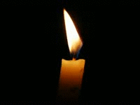 An animated gif of a candle flame in darkness.